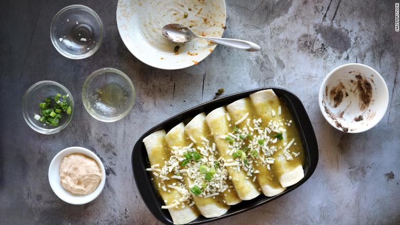 Use leftover Thanksgiving turkey to make turkey black bean enchiladas. 