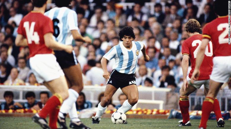 Maradona takes on the Belguim defence during the 1982 World Cup.