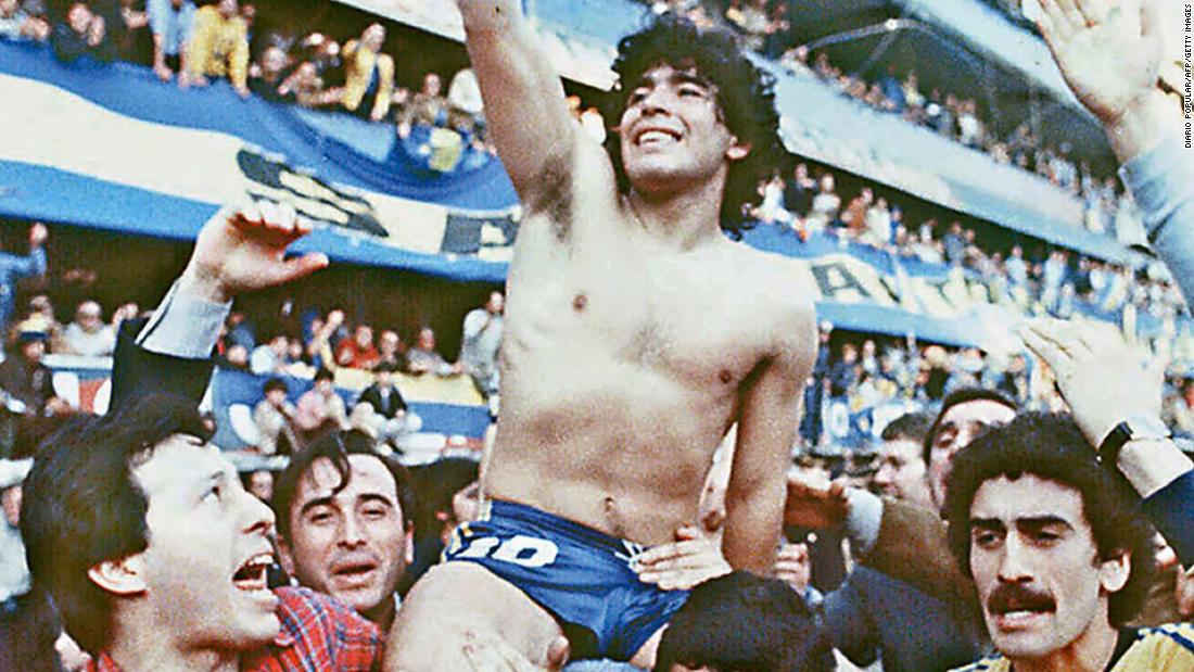 Maradona is carried by fans after leading Buenos Aires club Boca Juniors to a championship in 1981. The next year, Boca Juniors sold Maradona to Spanish club Barcelona for a world-record fee.