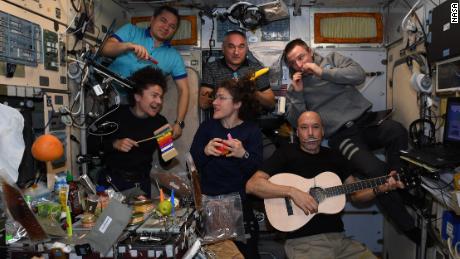 The crew has formed a band for serenade mission command centers around the world.