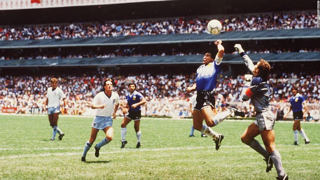 During the quarterfinals of the 1986 World Cup, Maradona outjumps England goalkeeper Peter Shilton to score. The ball went in off Maradona&#39;s hand and should have been disallowed, but the officials missed the call. It is now known as the &quot;Hand of God&quot; goal after Maradona said he hit the ball a little with his head &quot;and a little with the hand of God.&quot;