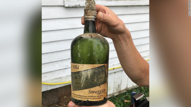 Couple finds more than 66 bottles of Prohibition-era whiskey hidden in the walls of their New York home