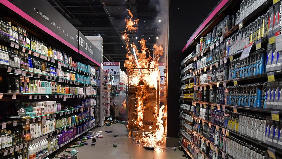  Products burn at a supermarket Carrefour in Sao Paulo, Brazil, on November 20, 2020 on Black Consciousness Day during a protest against racism.