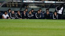 A powerless Mourinho and his staff stayed in the dugout for much of the second half of the game, as Barcelona took the score from 2-0 at half time to 5-0 at full time.