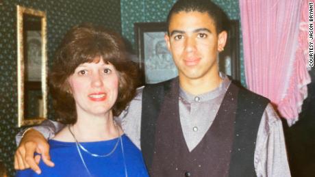 Bryant is pictured at 17 years old with his mother.