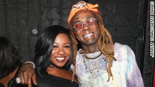 Reginae Carter and Lil Wayne in 2018.