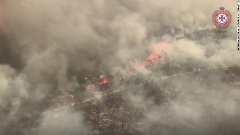 Aerial videos show bushfire burn through world&#39;s largest sand island