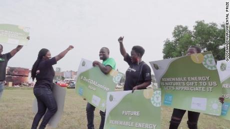 Campaigners draw public attention to Chibeze Ezekiel&#39;s movement on the dangers of coal and the need for renewables at a shopping mall in Accra, Ghana in September 2017.