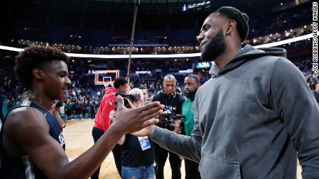COLUMBUS, OH - DECEMBER 14: LeBron &#39;Bronny&#39; James Jr. #0 of Sierra Canyon High School is greeted by his father LeBron James of the Los Angeles Lakers following the Ohio Scholastic Play-By-Play Classic against St. Vincent-St. Mary High School at Nationwide Arena on December 14, 2019 in Columbus, Ohio. (Photo by Joe Robbins/Getty Images)