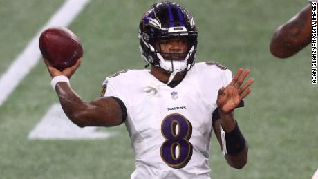Lamar Jackson passes in a game against the New England Patriots last month.