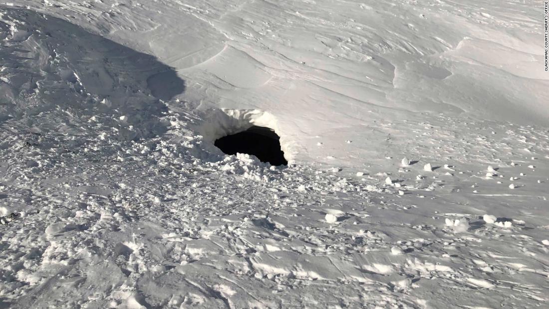 Climber is rescued alive after falling 15 feet into a volcanic fumarole ...