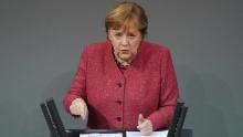 BERLIN, GERMANY - DECEMBER 09: German Chancellor Angela Merkel speaks during debates over next year&#39;s federal budget at the Bundestag during the second wave of the coronavirus pandemic on December 09, 2020 in Berlin, Germany. Merkel said that she see &quot;the light at the end of the tunnel&quot; with the introduction of vaccines against Covid-19, though she also made an impassioned plea for tighter lockdown measures. Germany recorded its highest rate of deaths related to Covid-19 in a 24 hour period today, with 590. (Photo by Sean Gallup/Getty Images)