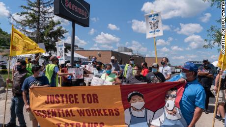 Advocates joined workers who were fired from Strauss Brands' meatpacking plant at a protest in August, accusing the company of unjustly retaliating against essential workers. The company denies retaliation had anything to do with the firings.