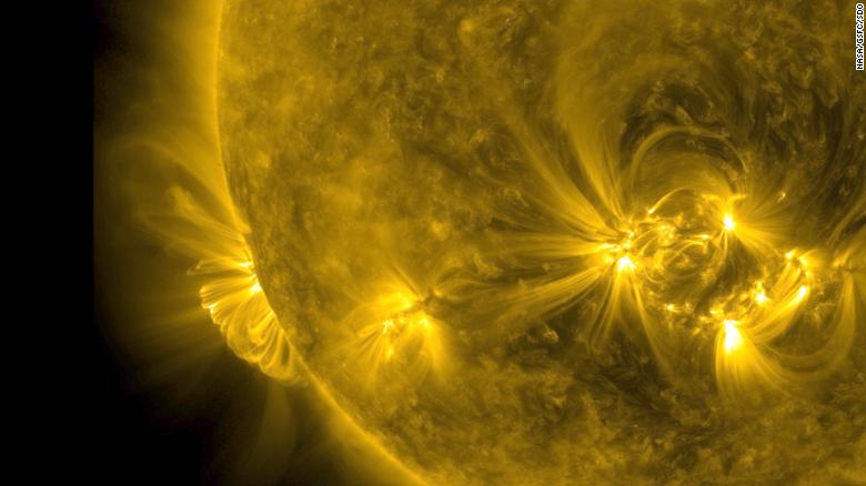 Solar material is captured erupting from the sun November 29.