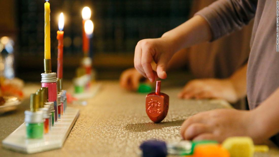 Hanukkah celebrations shine a light after a year of adversity