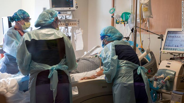 Nurses care for a Covid-19 positive patient at UMass Memorial Hospital on December 4, 2020 in Worcester, Massachusetts
