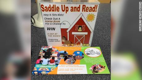 When students check out books, they&#39;re entered into a raffle to visit Gooch&#39;s family horse farm. 