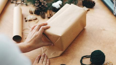 Brown paper packages tied up with string are a trendy and inexpensive alternative.