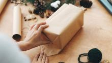 Brown paper packages tied up with string are a trendy and inexpensive alternative.