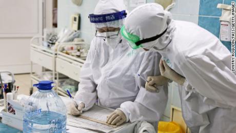 Medical staff at the infectious diseases department of Russia&#39;s Volgograd City Clinical Emergency Hospital No 15, which treats Covid-19 patients, on December 4.