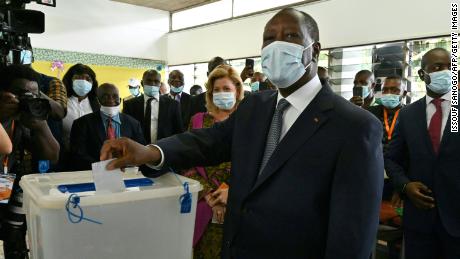 Ouattara casting his ballot at a polling station in Abidjan on October 31, during Ivory Coast&#39;s presidential election.