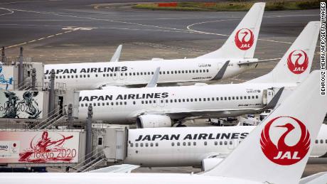 Passenger jets of Japan Airlines (JAL) are seen on the tarmac at Tokyo&#39;s Haneda airport on October 30, 2020. (Photo by Behrouz MEHRI / AFP) (Photo by BEHROUZ MEHRI/AFP via Getty Images)