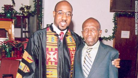 Raphael Warnock with his father, Jonathan Warnock, who died in 2010.