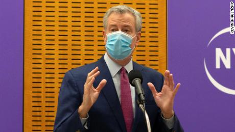 Mayor Bill de Blasio delivers remarks ahead of the first Covid-19 vaccinations at NYU Langone Hospital on Monday.