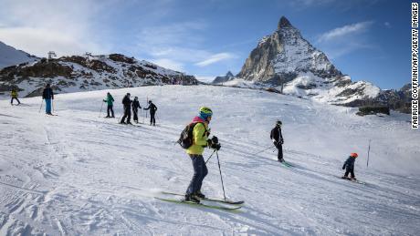 Skiers hit the slopes in the Swiss Alps on November 28.