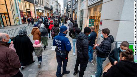 A policeman controls people in the main commercial street of Brussels, on December 5.