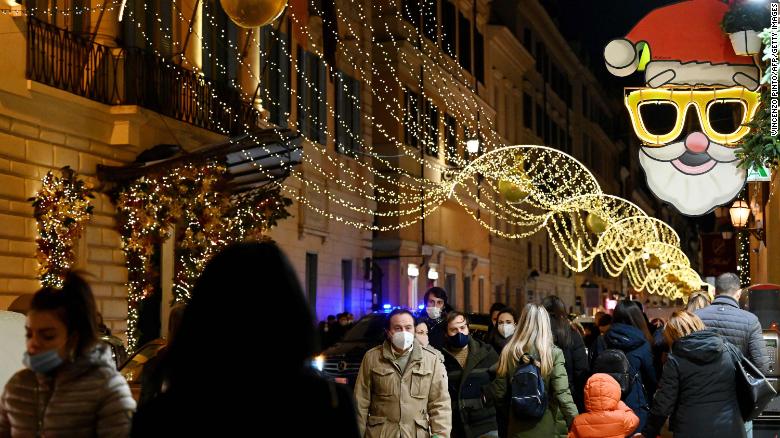 Italians do their Christmas shopping  near Rome's Piazza di Spagna on December 13.