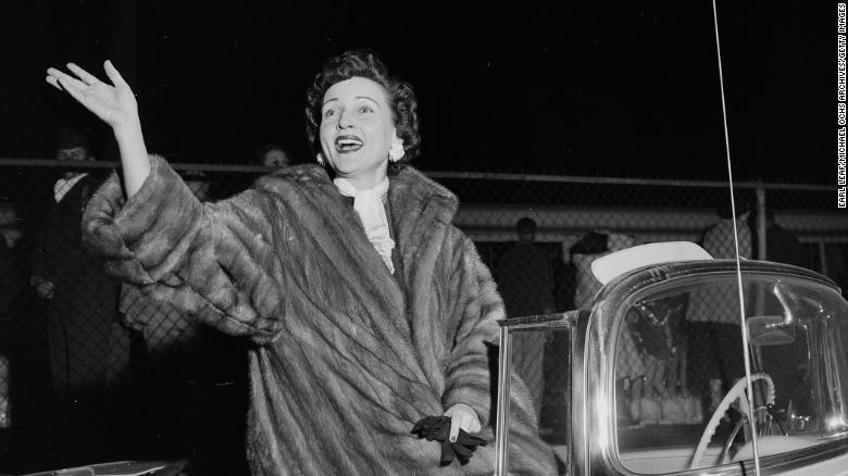 White rides in a Christmas parade in Los Angeles in 1955. 