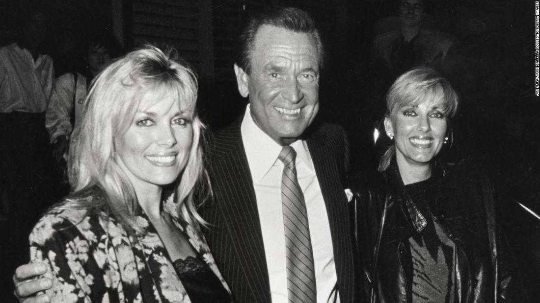 Barker poses with two &quot;Price Is Right&quot; models — Dian Parkinson, left, and Janice Pennington — in 1986. Parkinson sued Barker for sexual harassment in 1993, asking for $8 million. Barker denied the allegations and said they had a consensual relationship. The lawsuit was dropped in 1995.