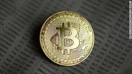 Bitcoin tops $20,000 milestone and continues to surge to record highs