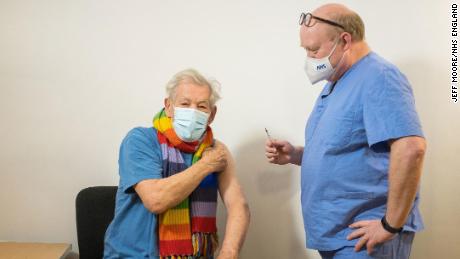 Ian McKellen talks to Dr Phil Bennett-Richards as he receives his first dose of the Covid-19 vaccine.