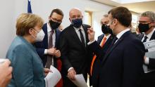 German Chancellor Angela Merkel, European Council President Charles Michel (center) and Macron at the EU Leaders Summit in Brussels on Friday, December 11.