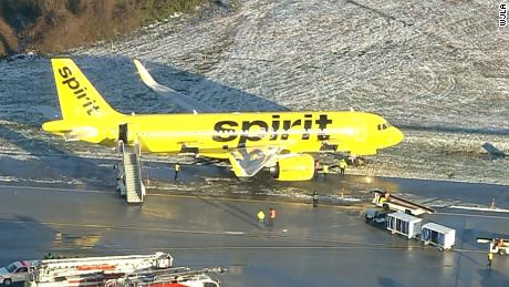 A Spirit Airlines plane&#39;s front wheel slid into the grass when it slid off the taxiway at BWI Airport.