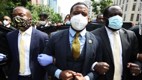 Members of Alpha Phi Alpha Fraternity marched in New York to a memorial service for George Floyd last summer.  The fraternity is among the groups leading campaigns to teach black people about the vaccine.