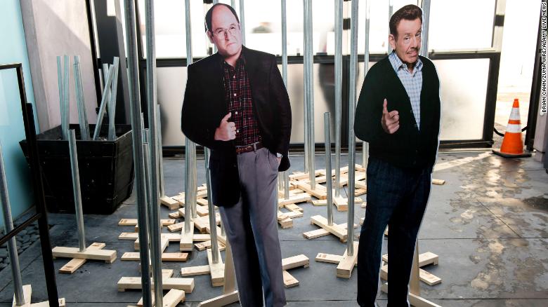 Cutouts of actors Jason Alexander (left) and the late Jerry Stiller are shown with Festivus poles that were to be given out to fans in line for Hulu's ''Seinfeld: The Apartment,'' a pop-up installation in West Hollywood, California, December 20, 2015. 