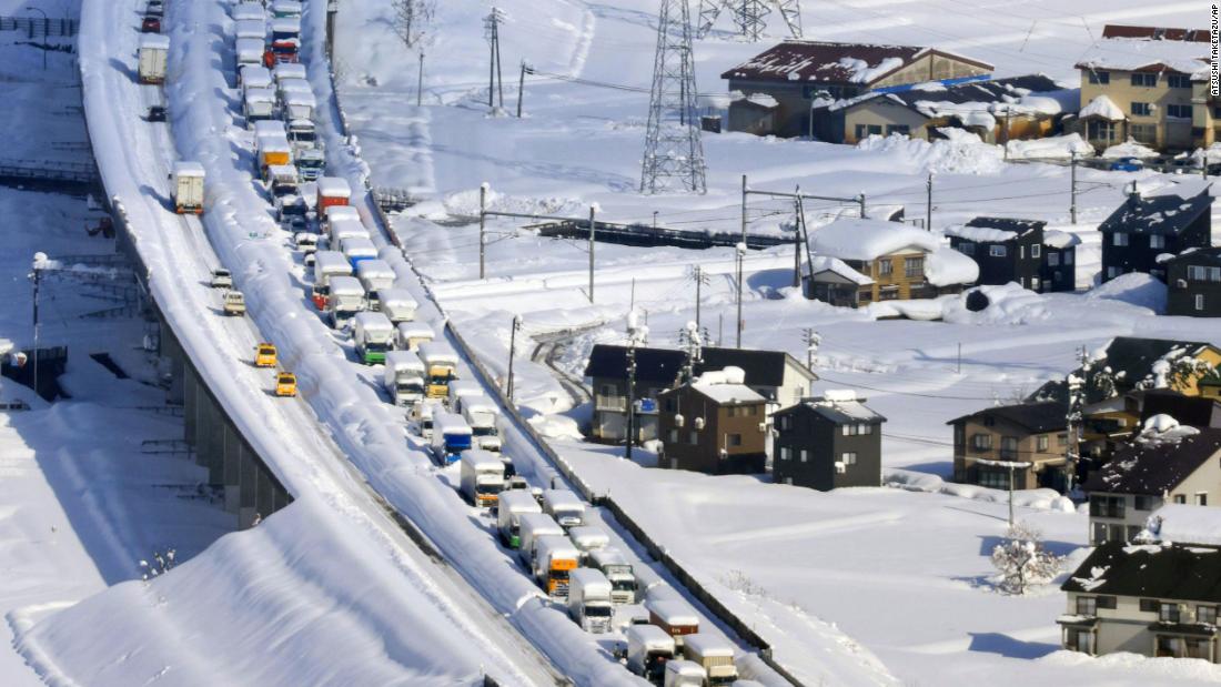 Japan blizzard: 1,000 people trapped in 9-mile traffic jam overnight
