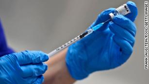 UK chief medical officers defend delay in giving the second Pfizer vaccine doses
