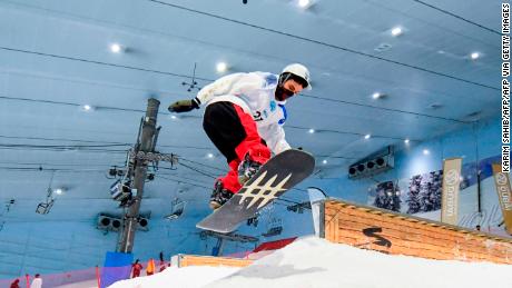 A snowboarder competing at the &quot;DXB Snow Week&quot; at Ski Dubai, on August 15, 2020. 