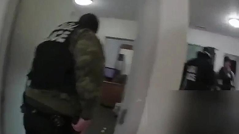 Bodycam video shows Chicago police raid on innocent woman's home 