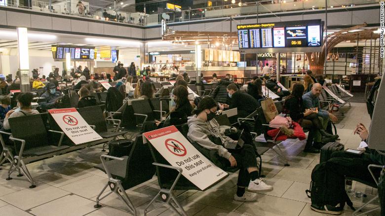 Christmas travellers at Heathrow airport, Heathrow, London, UK. Dec 20, 2020