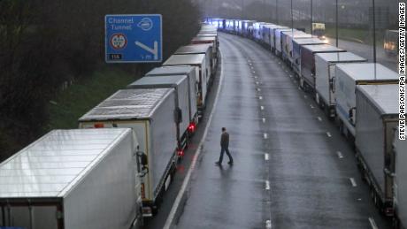 Trucks parked near Folkestone, Kent after the Port of Dover was closed and access to the Eurotunnel terminal was suspended after France said that it would not accept any passengers arriving from the UK for 48 hours.