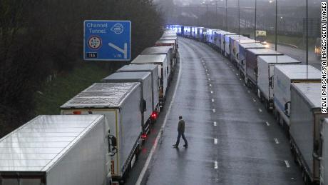 Trucks parked on the M20 highway near Folkestone, Kent, as part of Operation Stack after Dover Port closed and access to Eurotunnel suspended.