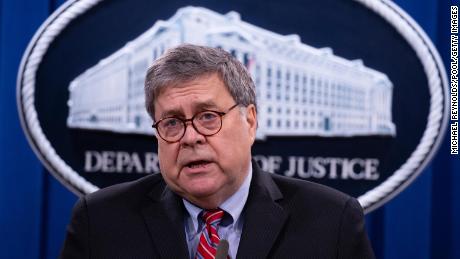 US Attorney General Bill Barr holds a news conference to provide an update on the investigation of the terrorist bombing of Pan Am flight 103 on the 32nd anniversary of the attack, at the Department of Justice December 21, 2020 in Washington, DC. 