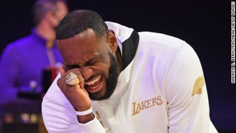 LeBron James reacts as he gets his 2019-20 NBA Championship ring during the ring ceremony.