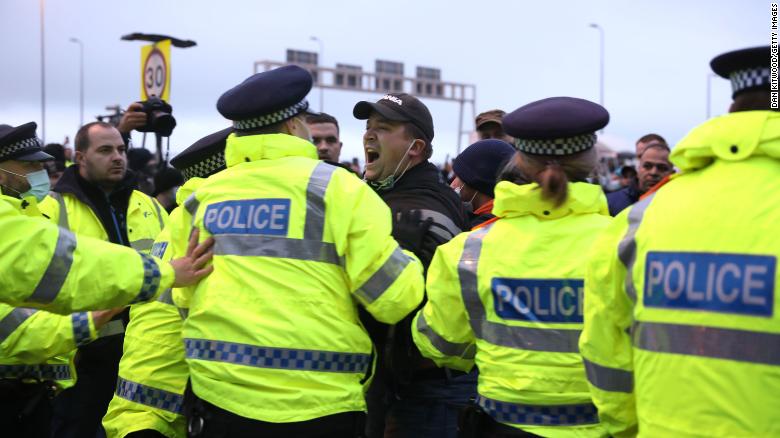 Tensions high in Dover as stranded drivers seen shouting at police
