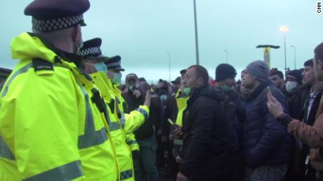 Truck drivers clash with police at Dover as France reopens border with the UK